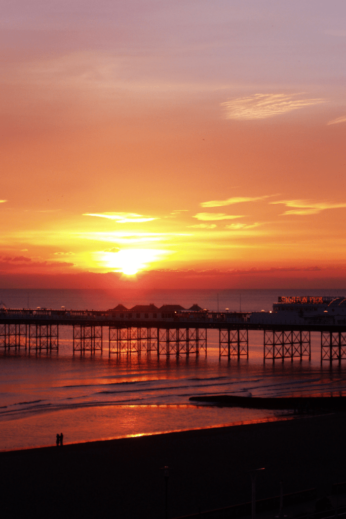 A bright, bold sunset overlooks Brighton Pier. Looking for therapy Brighton? Book your therapy consultation with Joseph Bailey today.